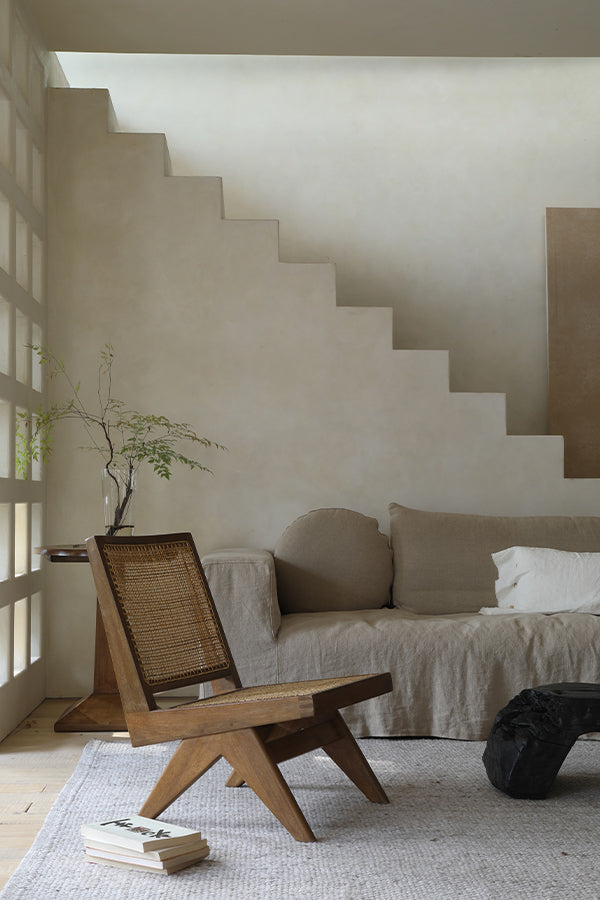 Chandigarh Armless Easy Chair in natural setting with minimal decor and soft textures.