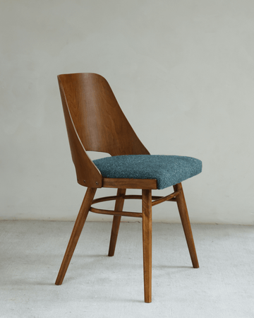 Shell Chair - Teak wood chair with blue loop fabric seat, mid-century modern design.