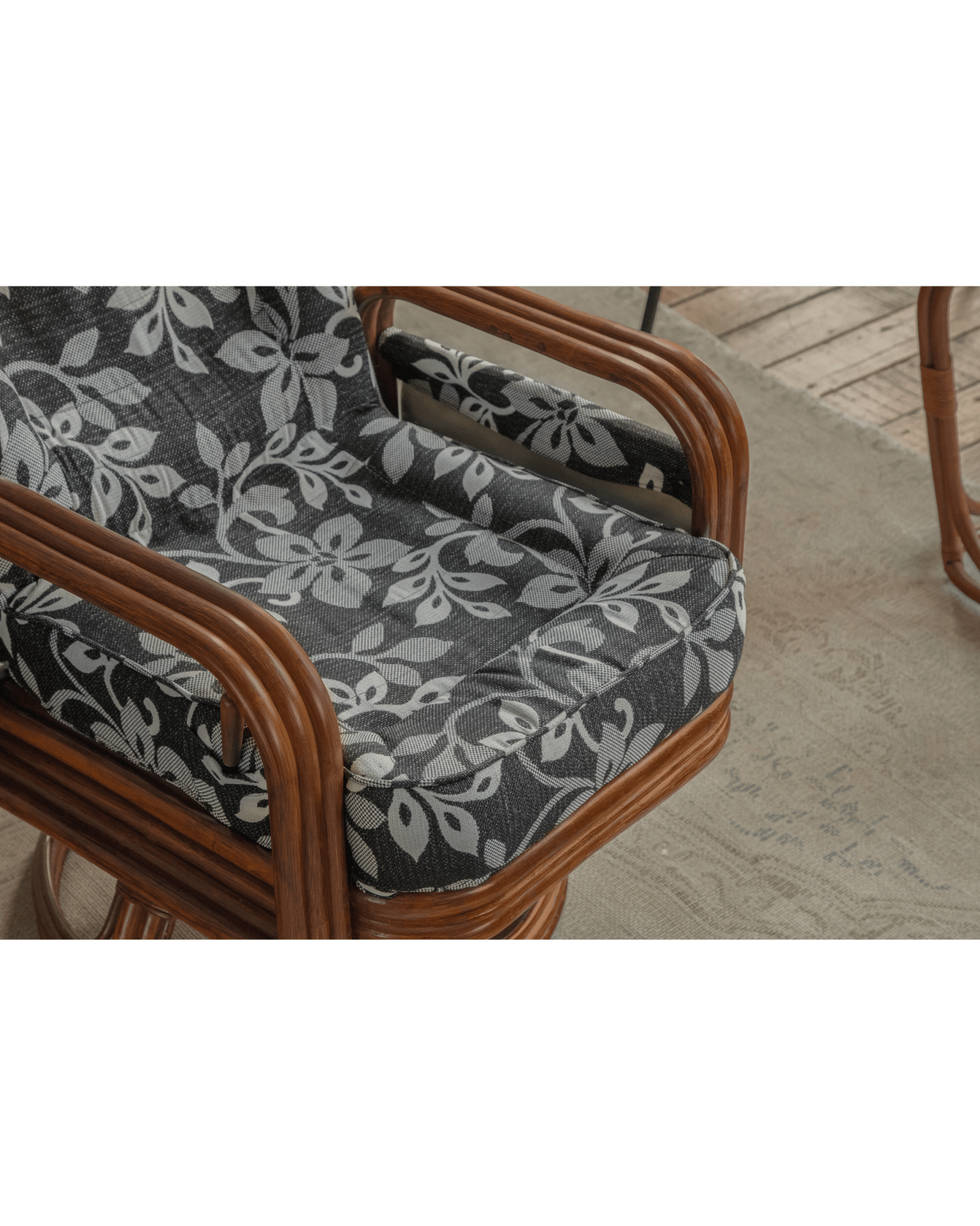 Willow rattan chair with floral cushion, Indonesian rattan frame, for modern comfort