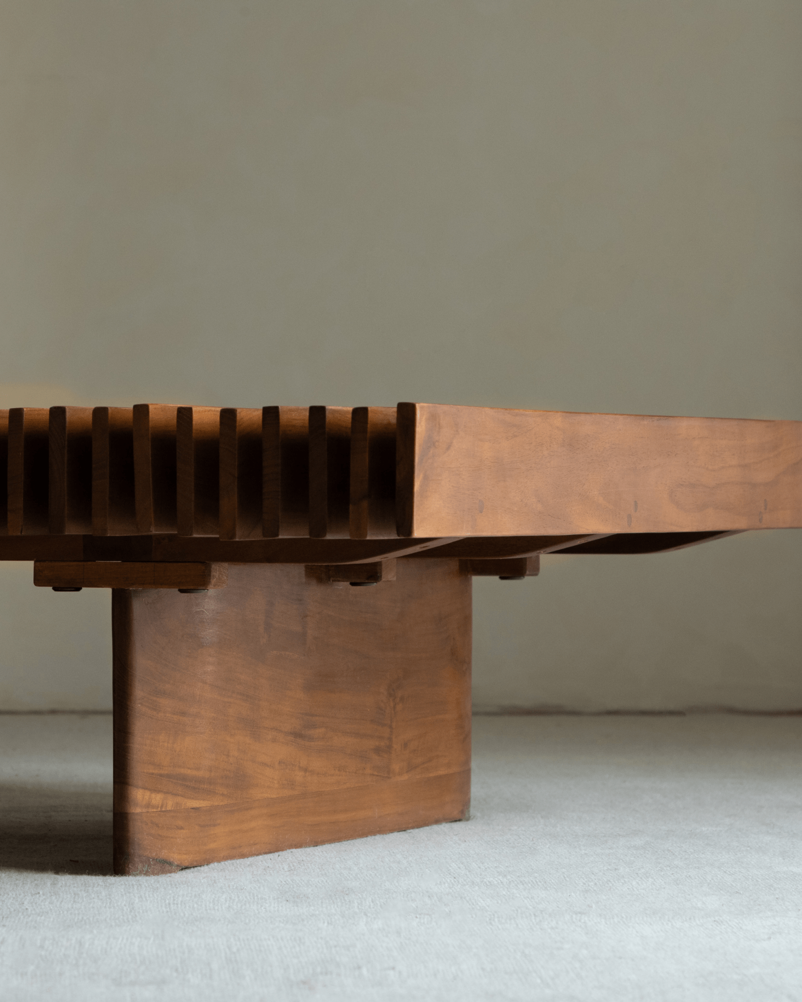 Riva Coffee Table detail: Solid teak wood slatted design, modern organic style centerpiece.