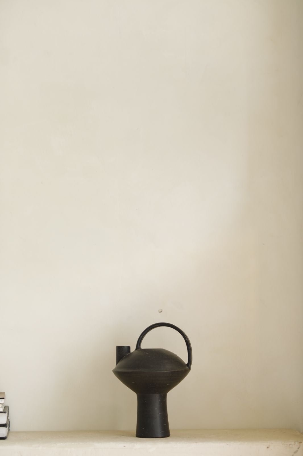 Black ceramic vase with handle, for home decor, minimalist design