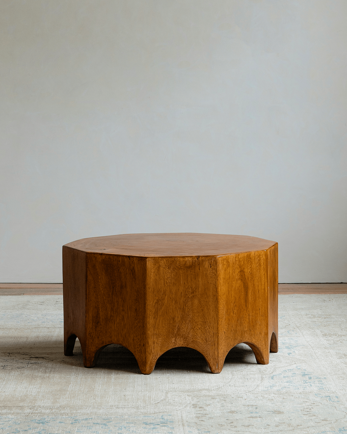 Decagon Side Table crafted from solid rainwood with a unique architectural ten-sided design.