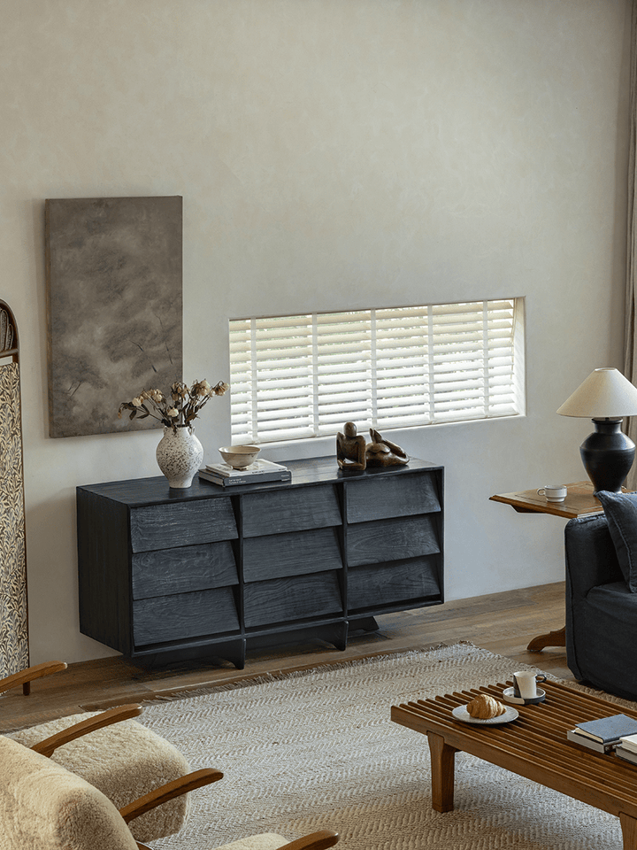 Stylish NO.9 Sideboard in a modern living room with art and a lamp.