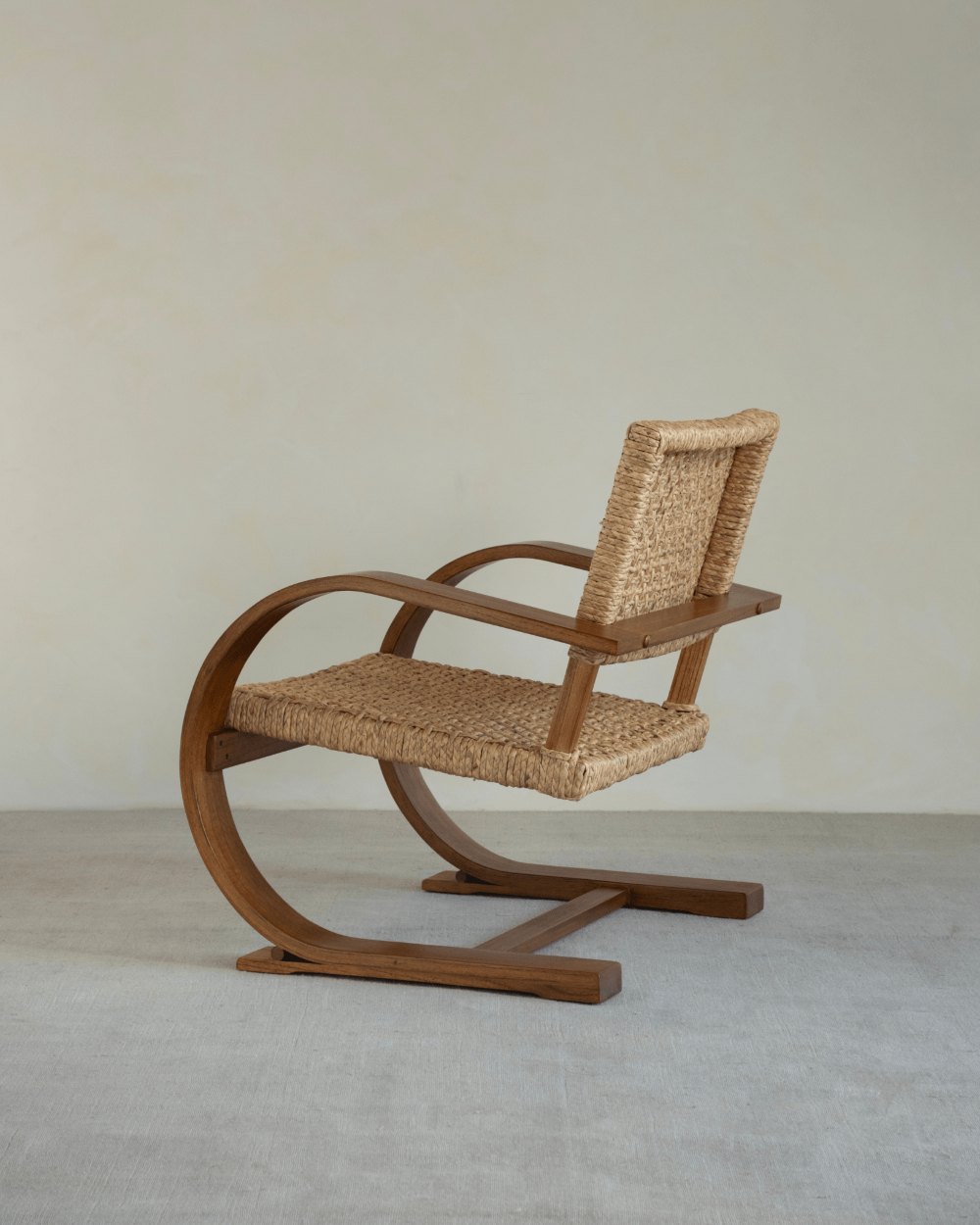 C Curve Lounge Chair with Bentwood Frame and woven grass rope seat, Mid-Century Modern design.