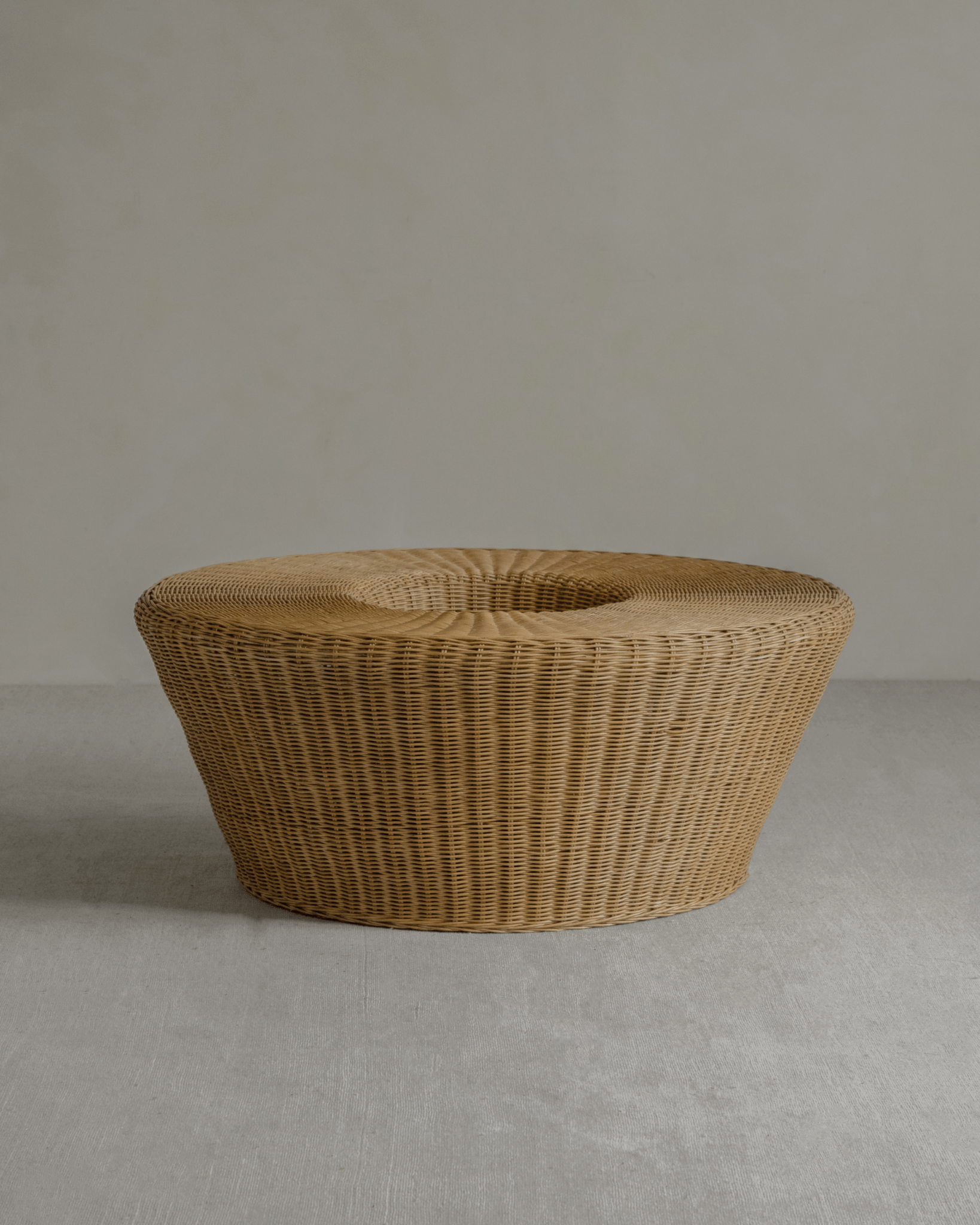 Nest Coffee Table with woven rattan design, sunken storage and natural rattan color.