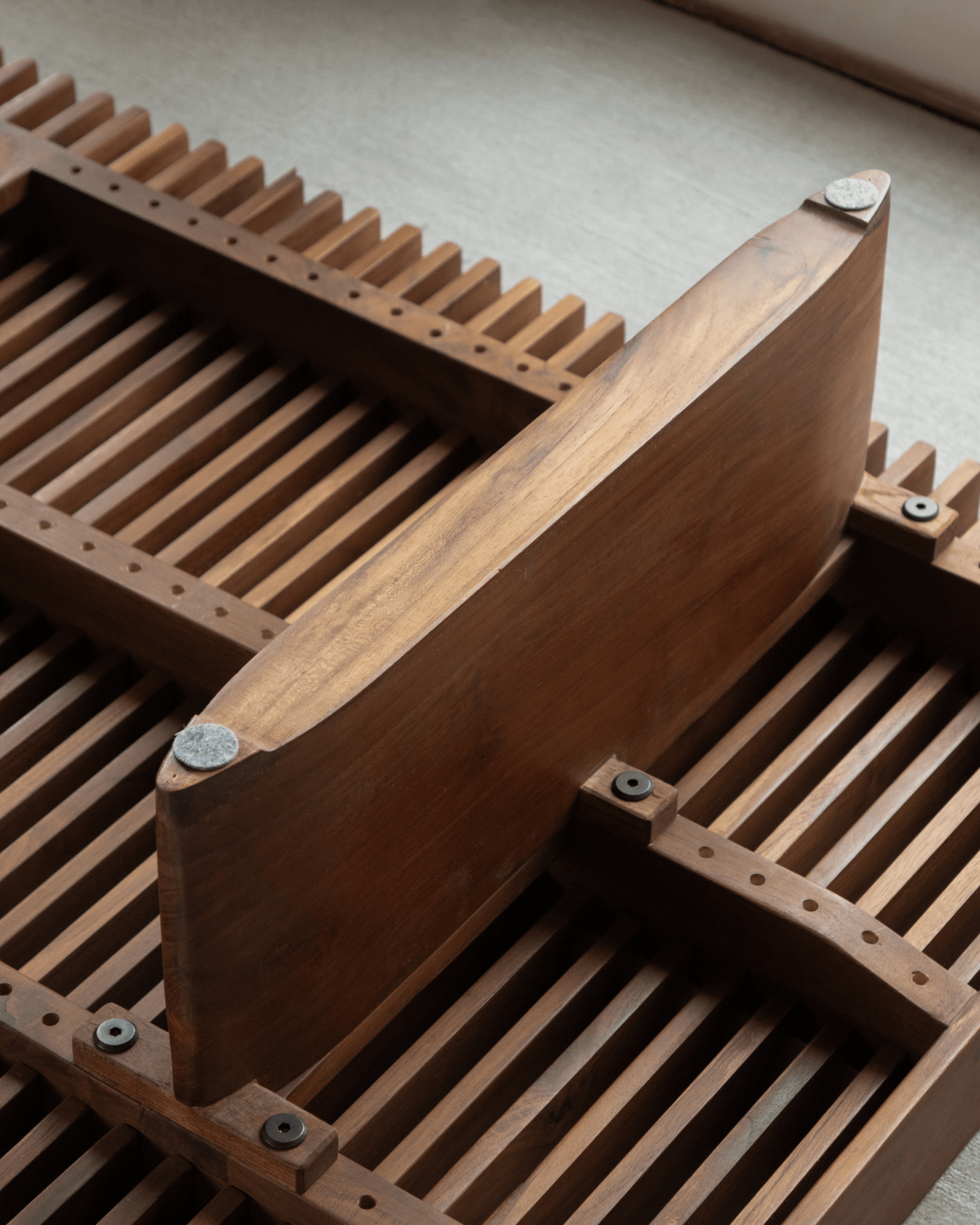 Riva Coffee Table detail: Solid teak wood slatted design, highlighting modern organic craftsmanship.