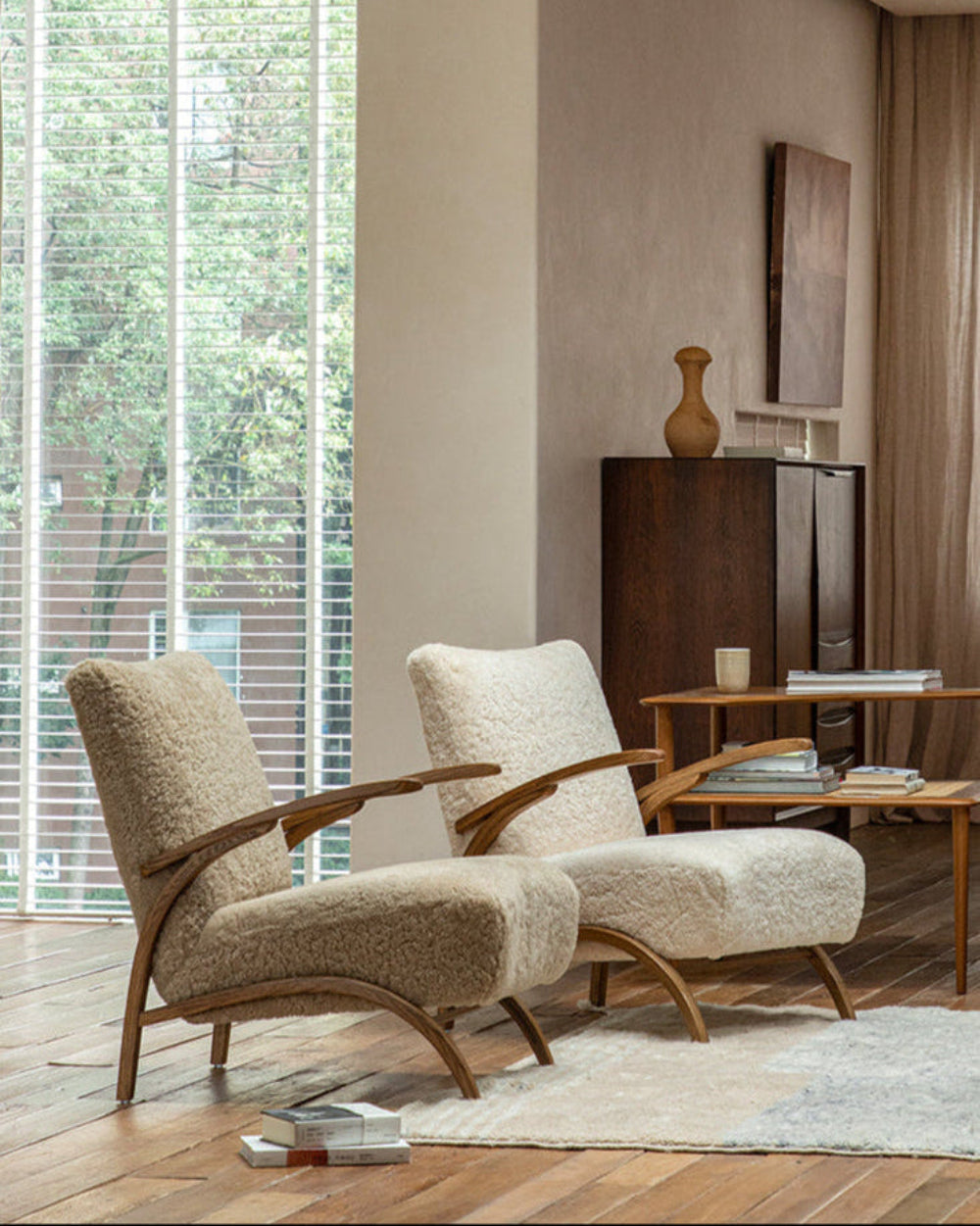 Nebula Lounge Chair in shearling upholstery with red oak frame, mid-century modern living room setting, cozy and comfortable.