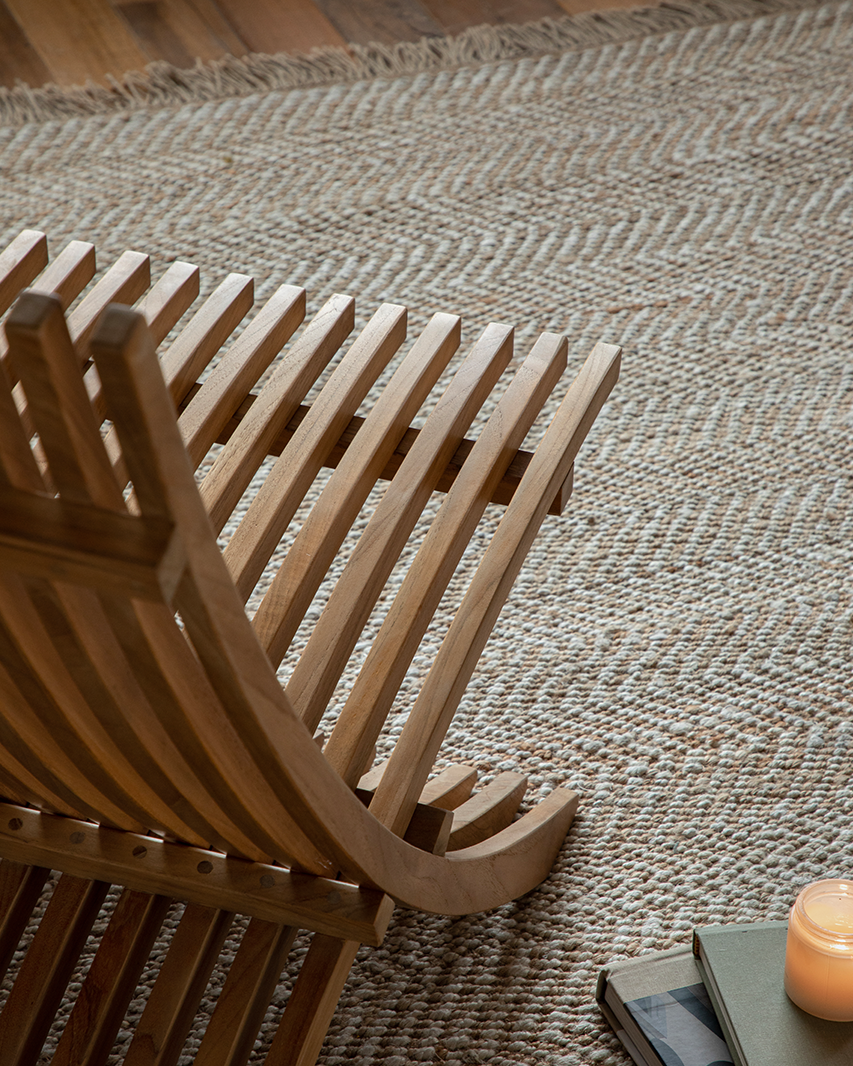 Oly Lounge Chair in wooden slatted design, interior setting, for comfortable relaxation