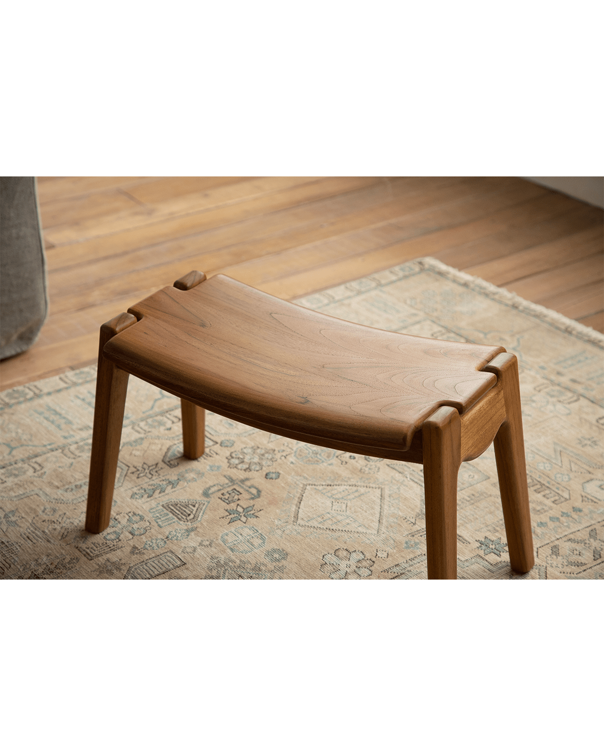 Wooden Zen footstool for relaxation, light brown finish, minimalist design