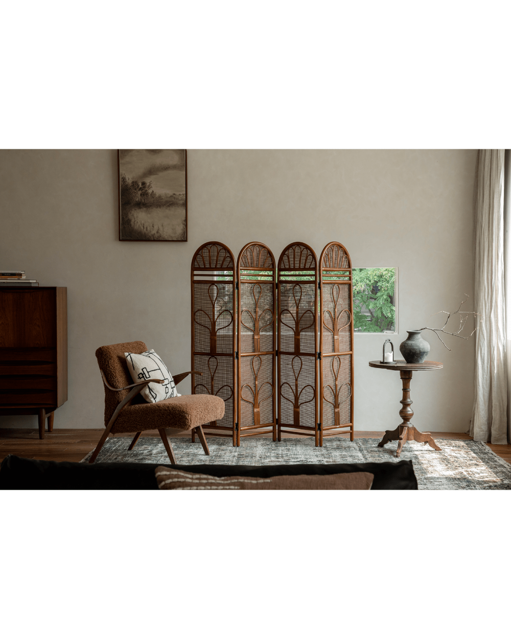 GeTan Rattan Room Divider: natural woven four-panel screen with arched top and leaf pattern.