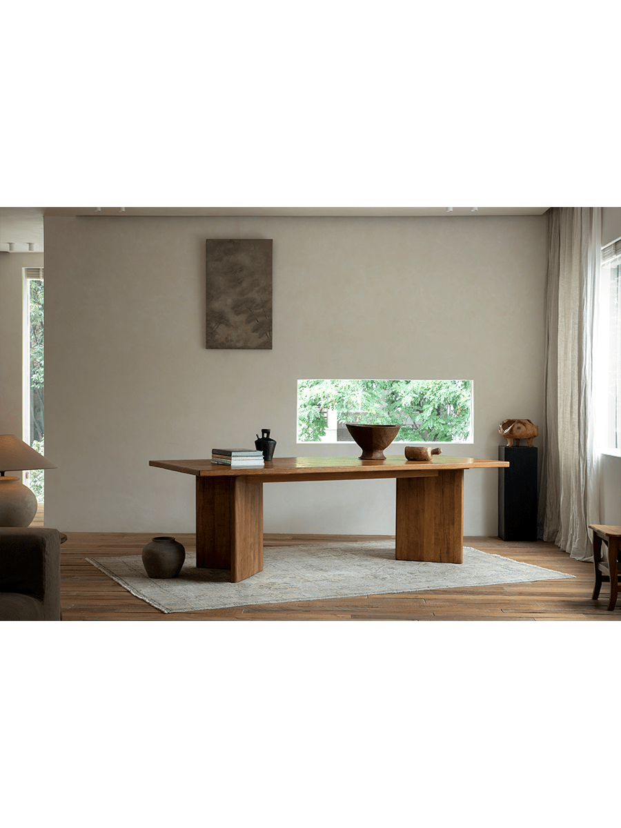 Zephyr Dining Table in natural wood with solid legs, minimalist design, perfect for bright dining rooms