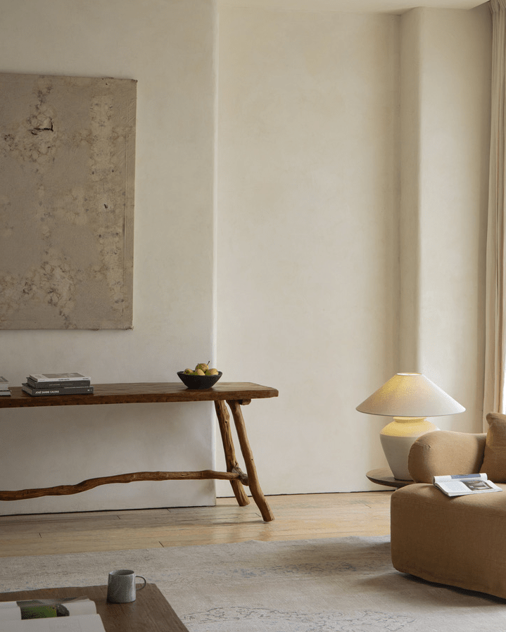 Branch Console Table in rustic setting, natural wood grain, branch legs, and artisanal construction