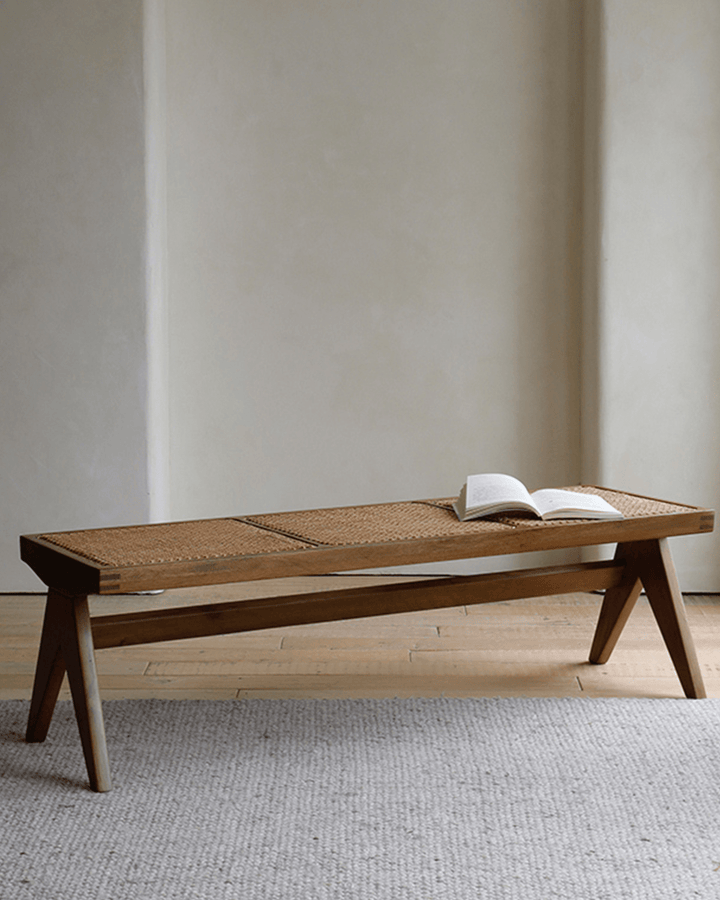 Chandigarh bench in teak wood with rattan seat and open book on top