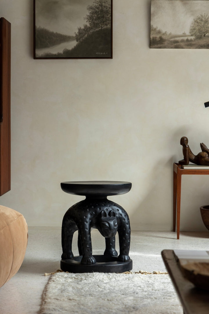 Panther-shaped African Tribal Sculptural End Table, perfect for adding style to modern living spaces.