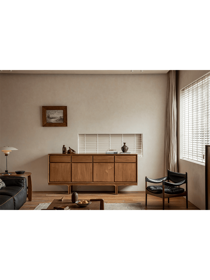 NO.44 teak sideboard in cozy living space with natural light and decorative accents.
