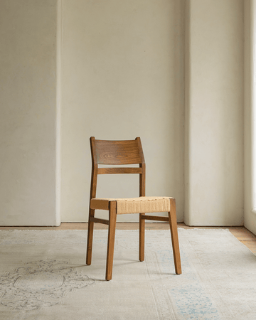 Beam Chair with Teak Wood Frame and Woven Seat. Perfect for adding natural warmth to any room.