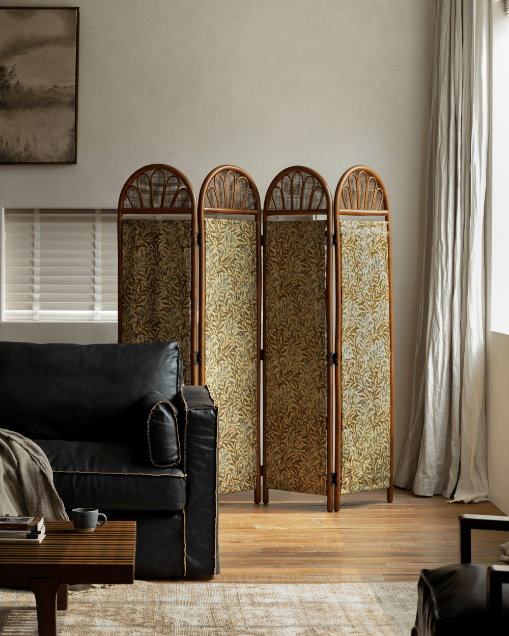 GeTan Rattan Room Divider with agate vine frame and removable leaf-pattern fabric panels.