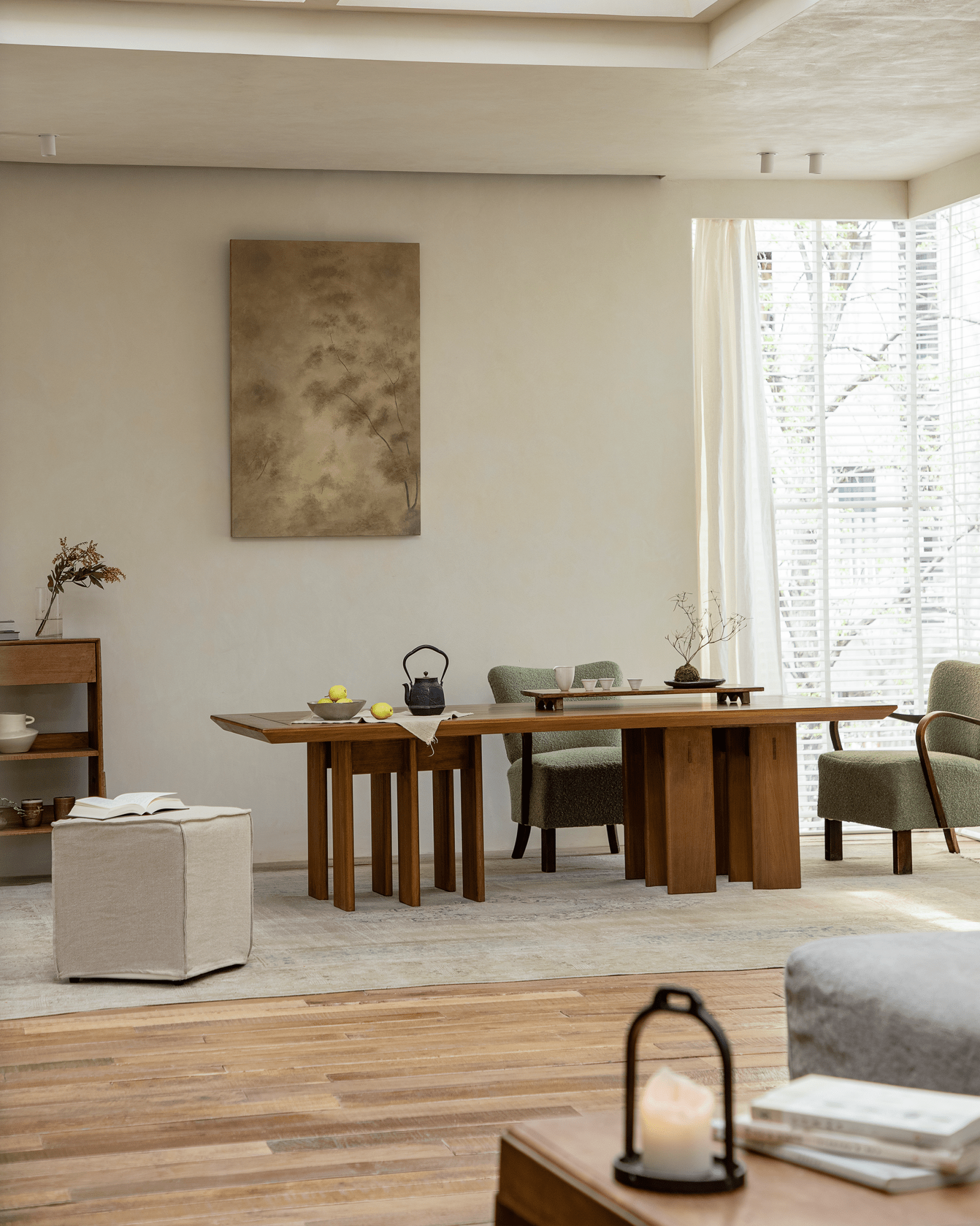 Titan Teak Dining Table in a modern dining room setting with teak wood and matching chairs, natural light