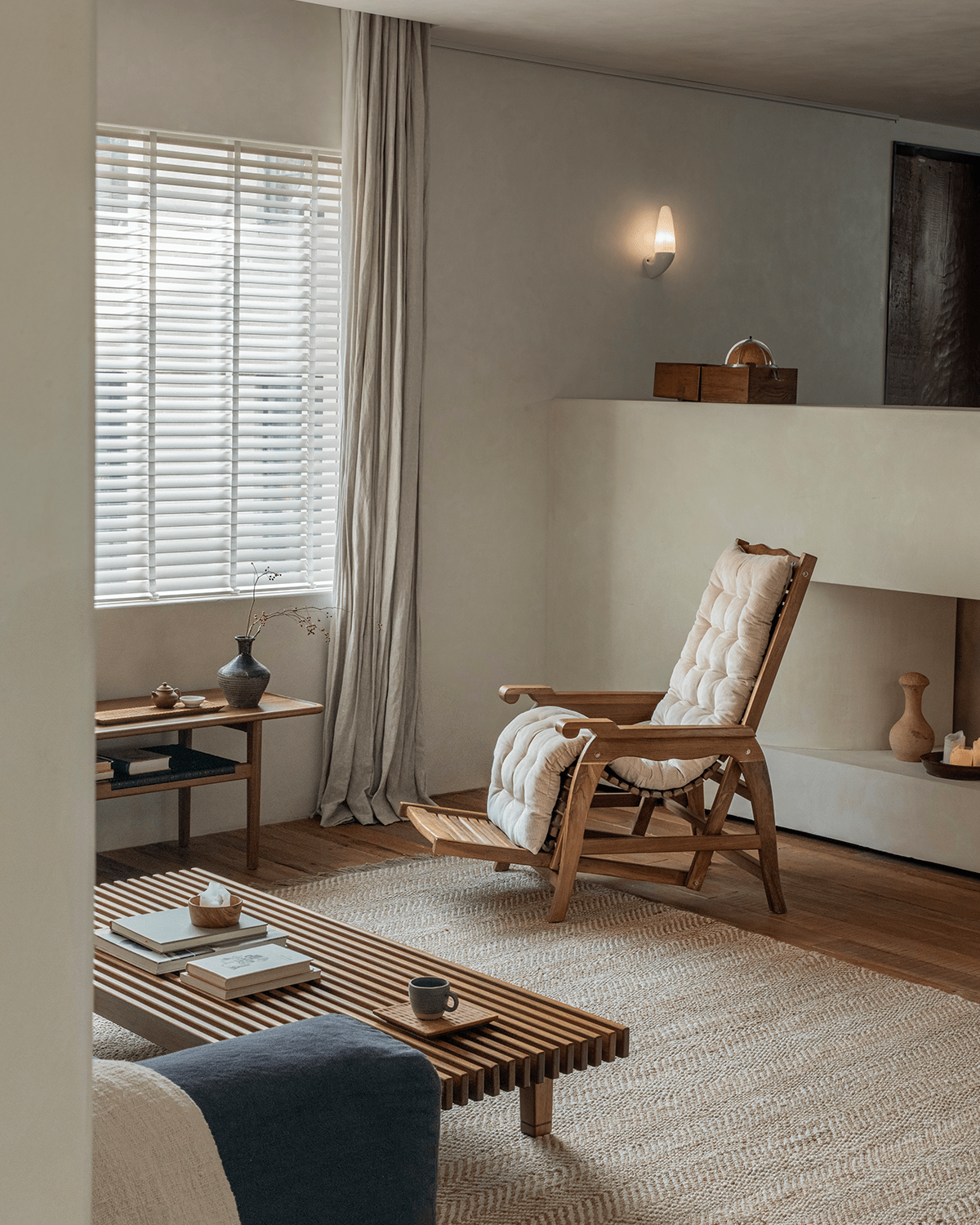 Teak Roller Chaise Lounge in a cozy living room setting, showcasing design and comfort