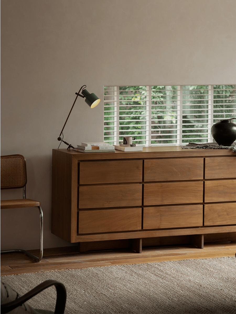 Palette Sideboard in a modern living room setting, crafted from solid teak wood with ample storage and elegant design