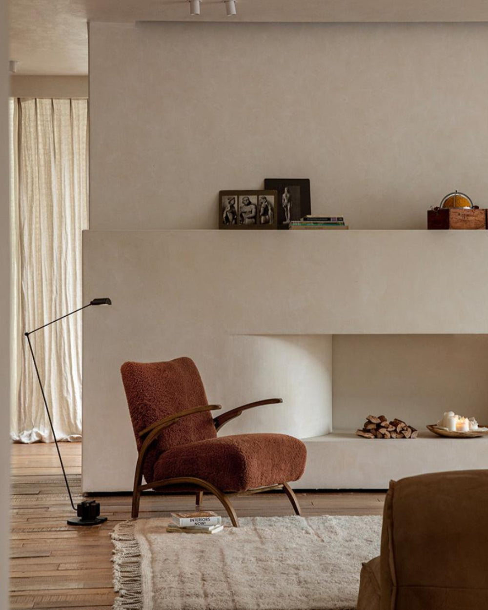 Nebula Lounge Chair with shearling upholstery in cozy living room, mid-century modern design, Interiors Now!