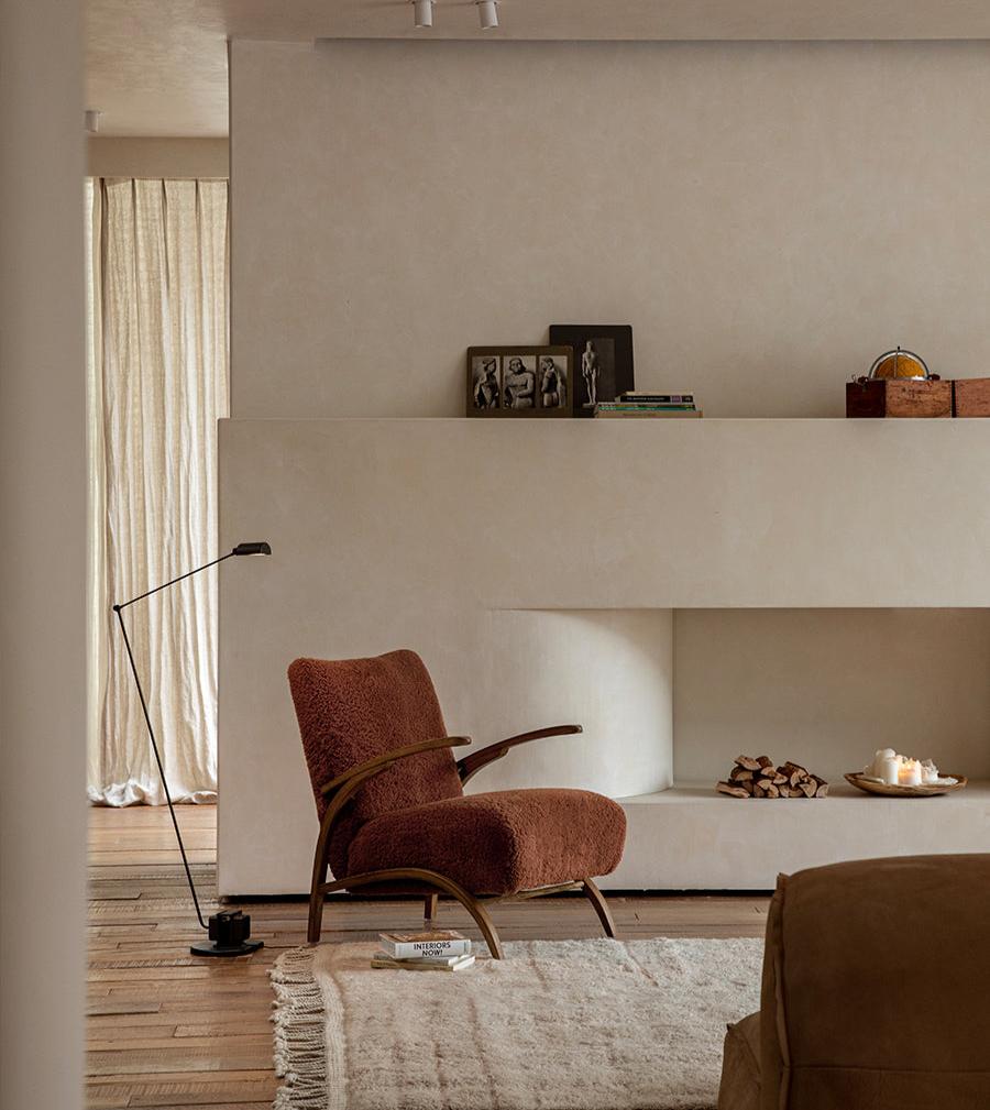Nebula Lounge Chair with shearling upholstery in cozy living room, mid-century modern design, Interiors Now!