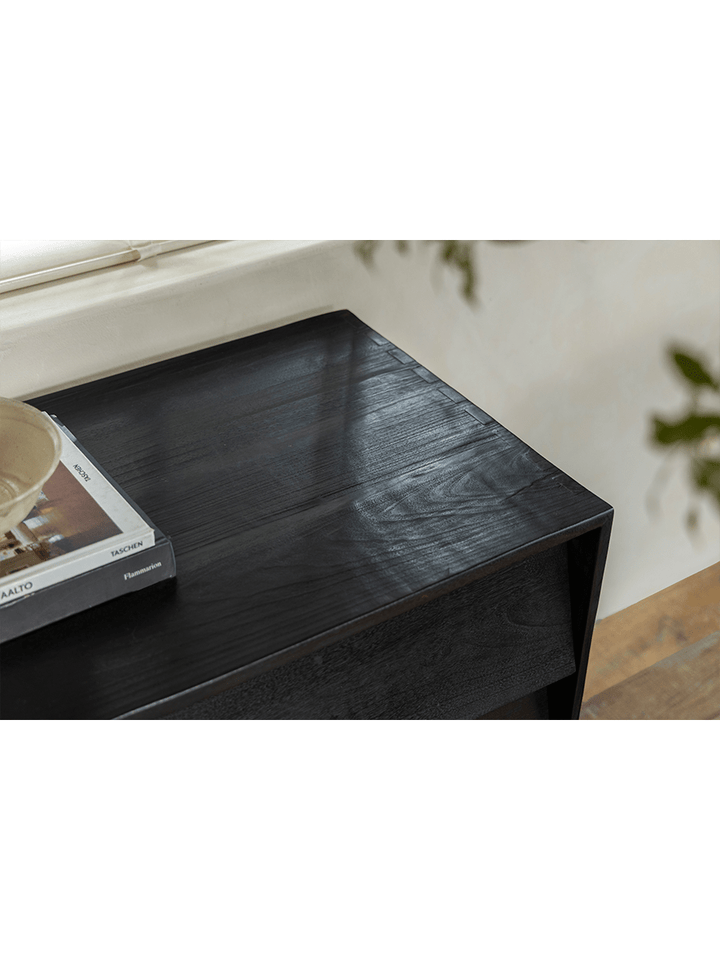 Close-up of NO.9 Sideboard top showcasing reclaimed wood texture and magazine.