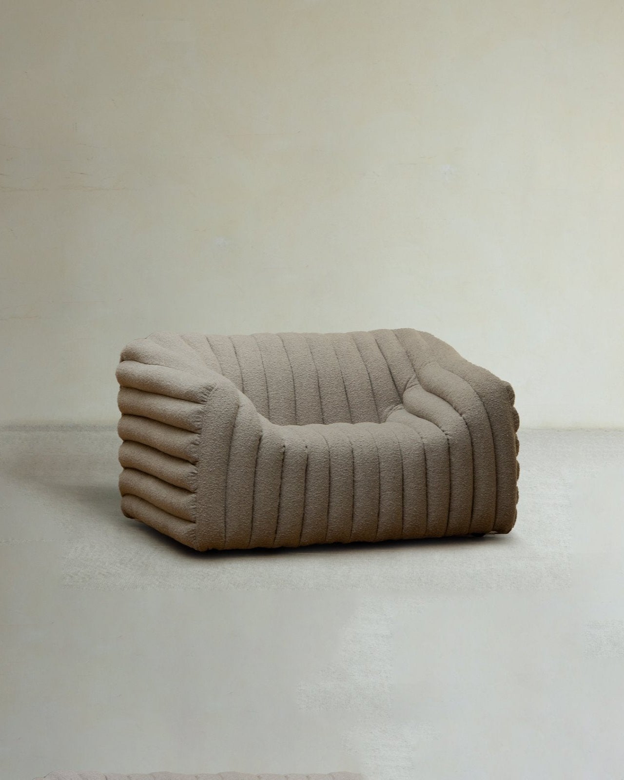 Miche Sofa in beige, soft and comfortable with vertical ribbed design, perfect for cozy living spaces