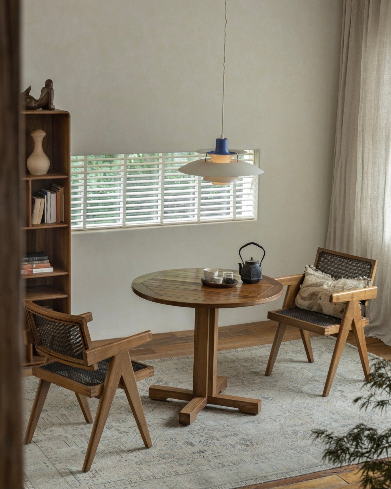 Ruby teak round table with chairs, perfect for dining or leisure, featuring solid wood craftsmanship and stable structure
