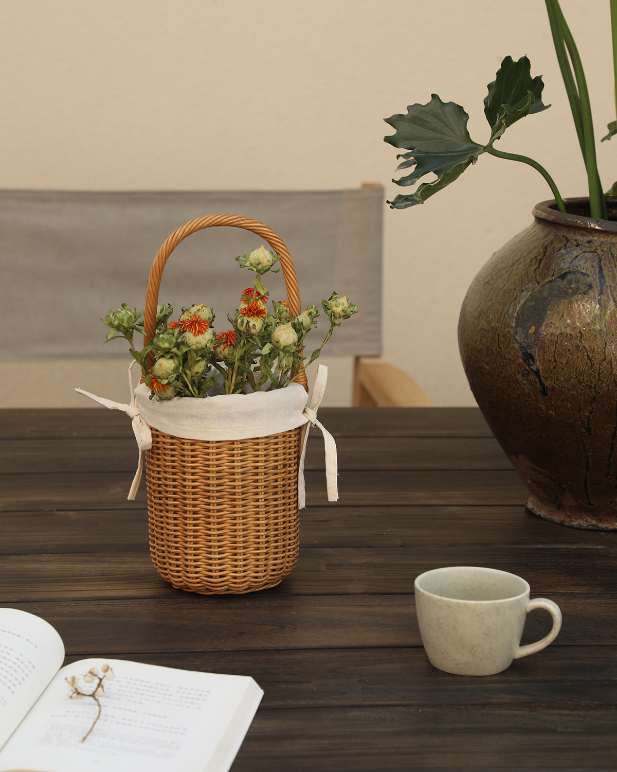 Iris Basket: Hand-woven natural rattan with dried flowers and white cotton lining.