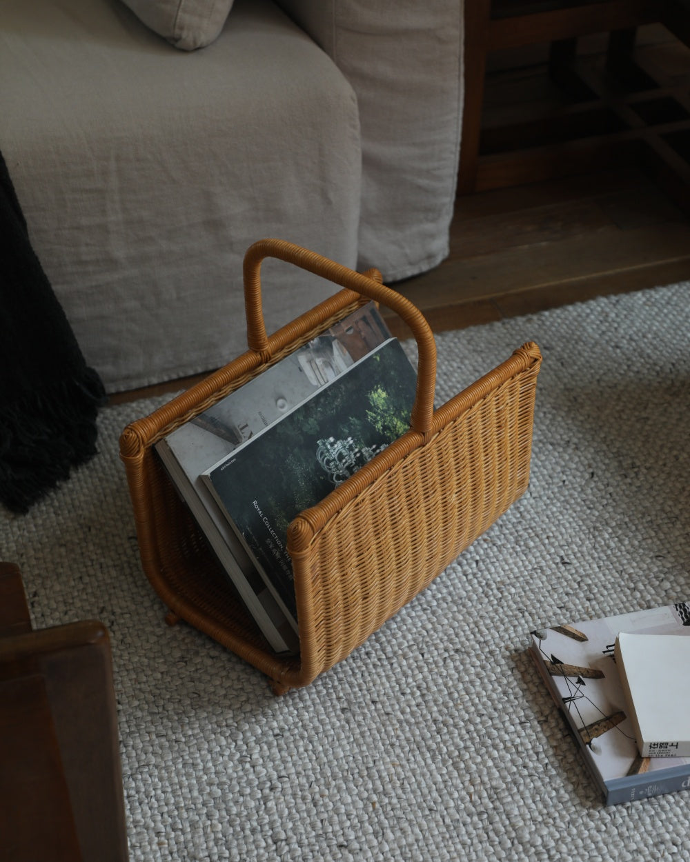 Textured woven Folio Caddy holding Folio Book Collection magazines and books.