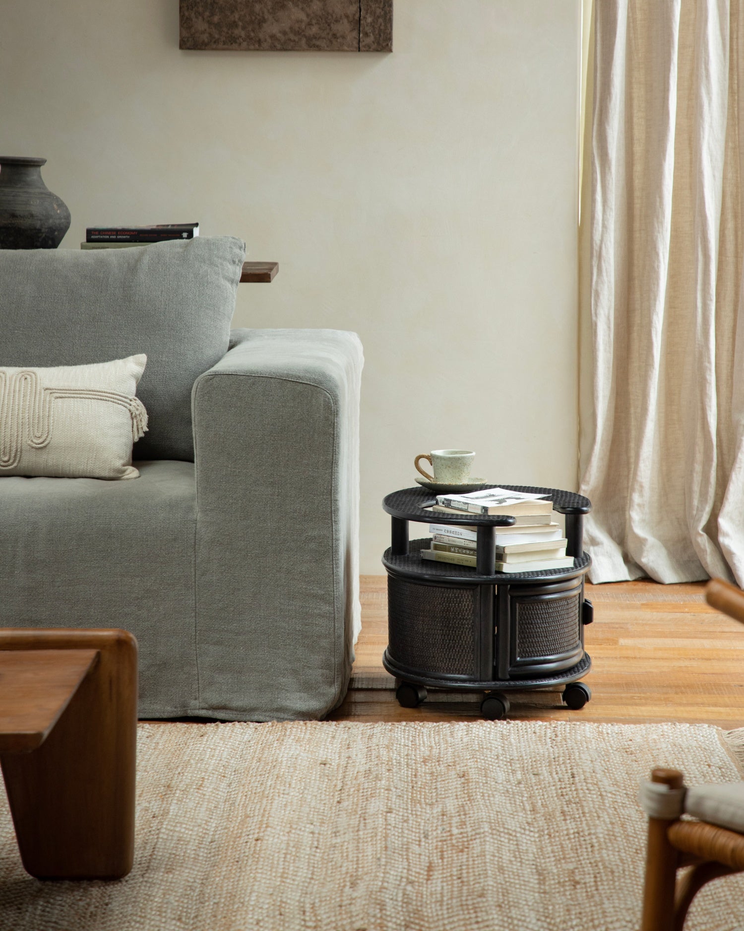 Noa Rattan Wheeled Table