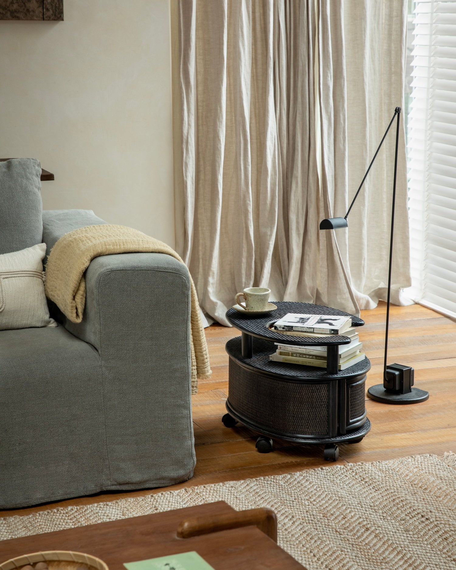 Noa Rattan Wheeled Table