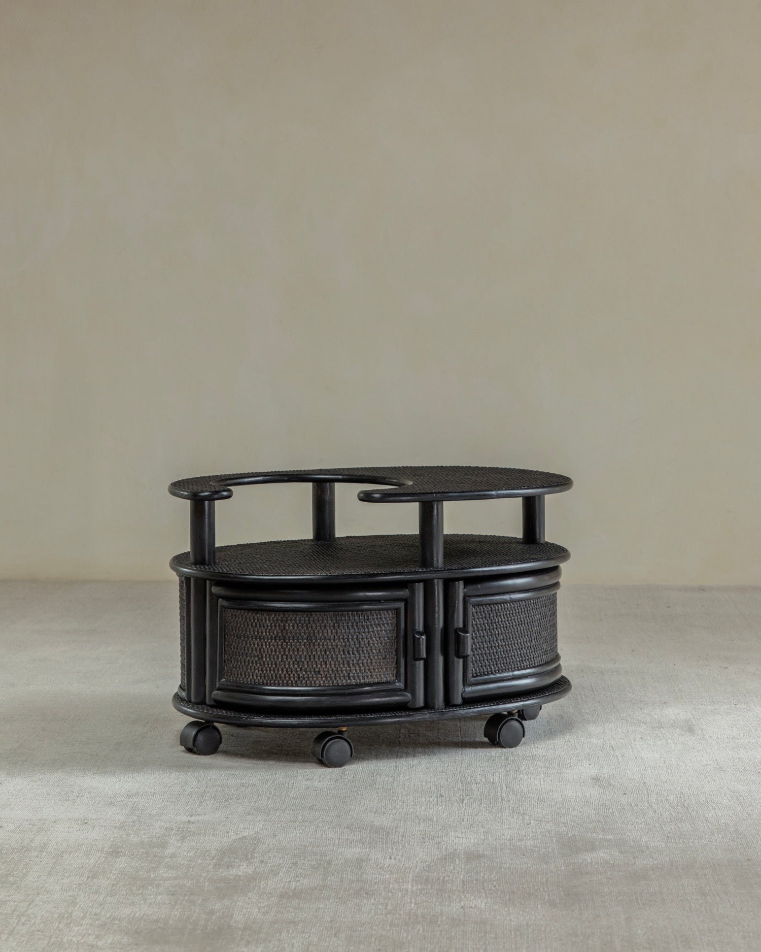 Noa Rattan Wheeled Table