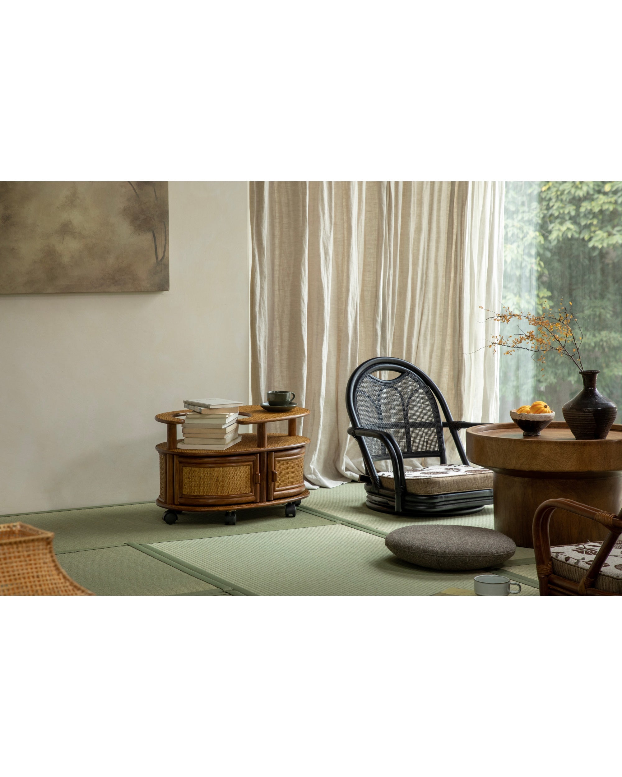 Noa Rattan Wheeled Table