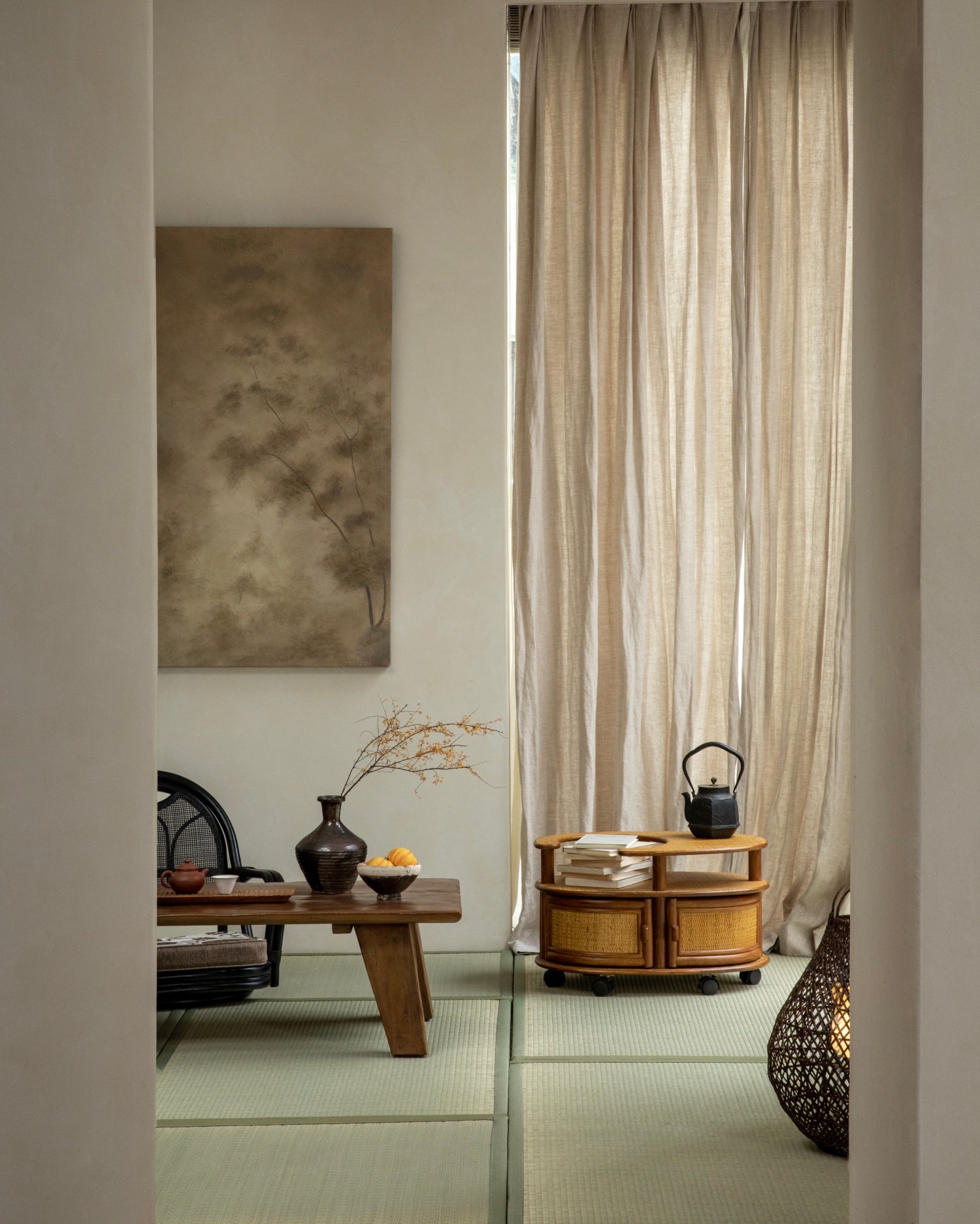 Noa Rattan Wheeled Table