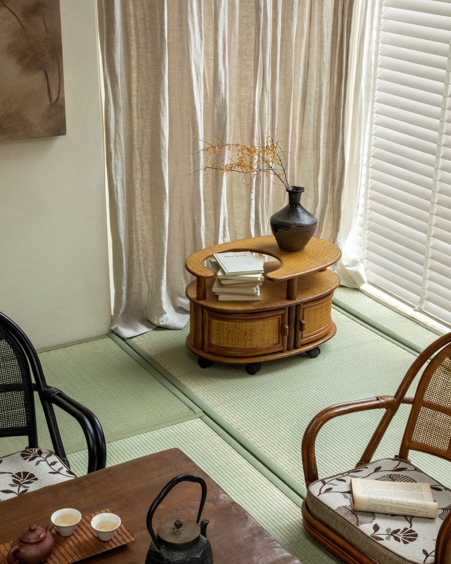 Noa Rattan Wheeled Table