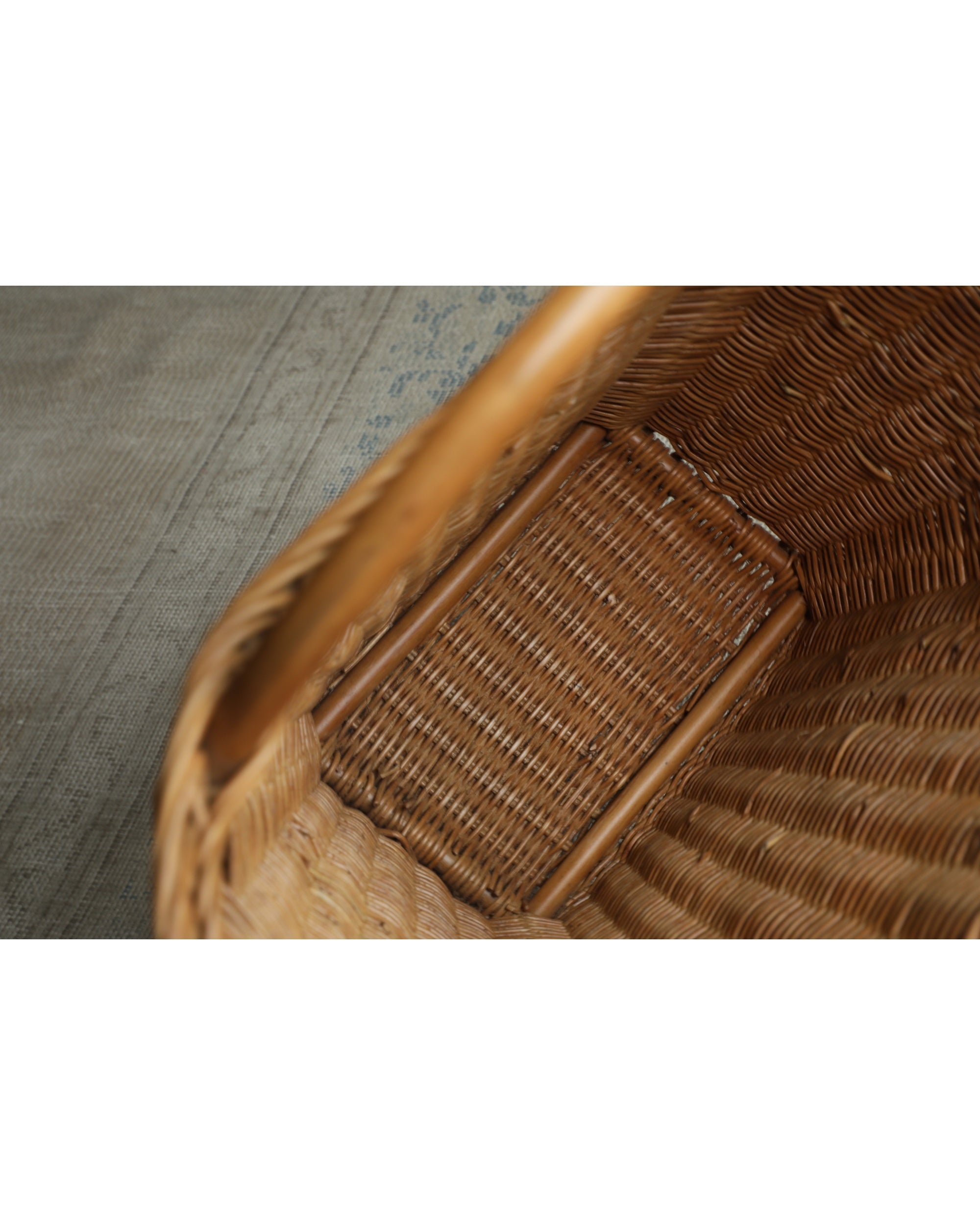 Luna Storage Basket: close-up of fine woven rattan interior texture