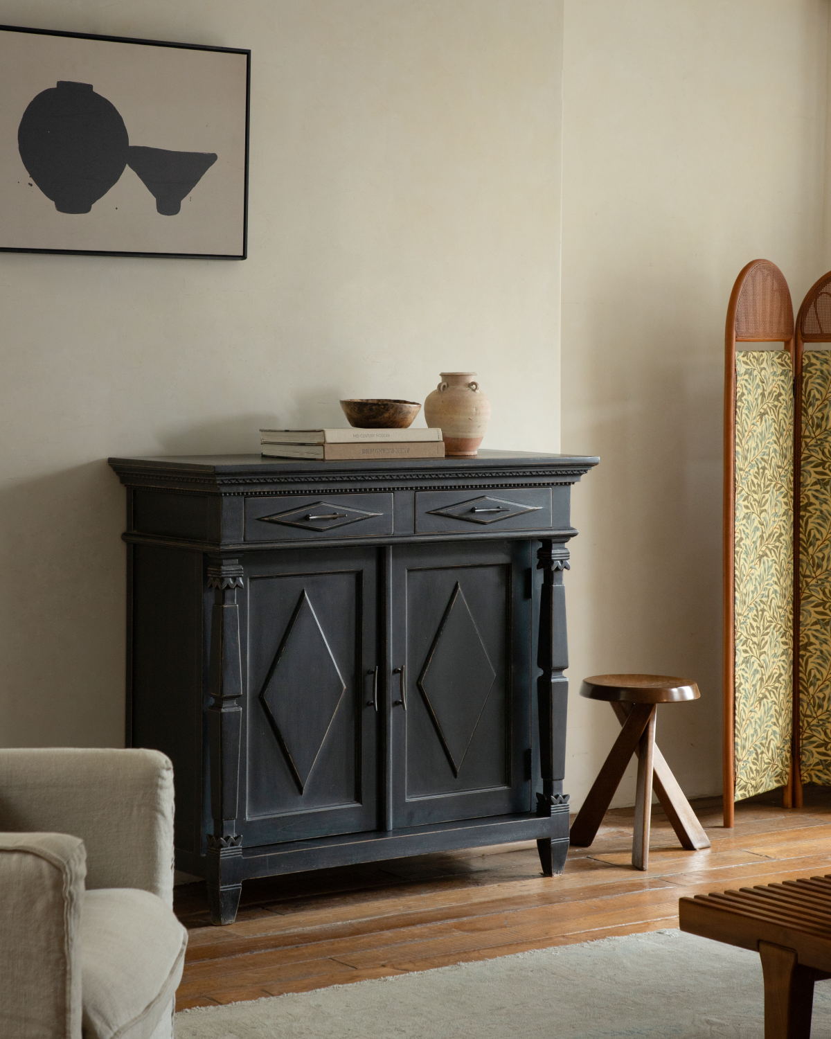 Victoria teak cabinet with vintage finish, carved details, and diamond door panels