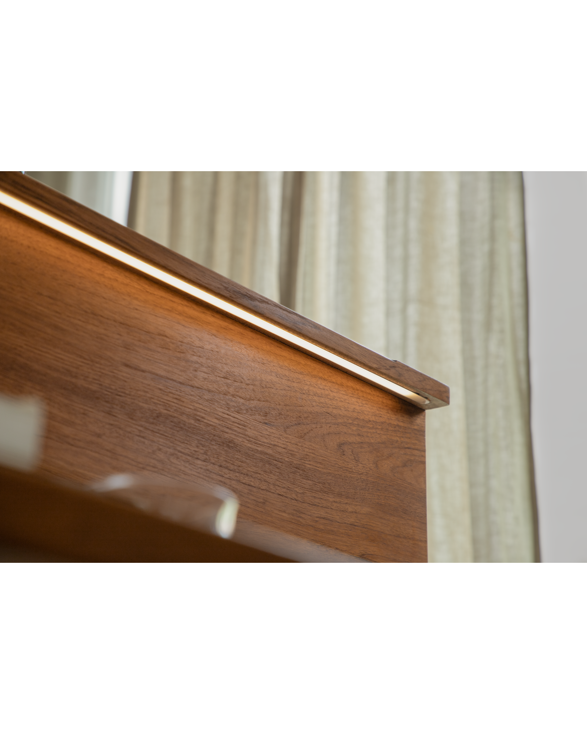 Elegant Evan Office Desk with integrated LED light on teak wood edge.