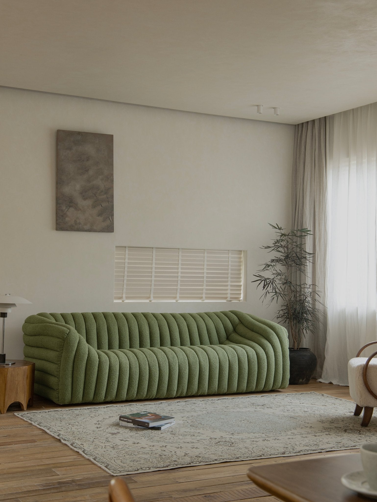 Miche Sofa in green, soft and comfortable, with a cozy living room setting
