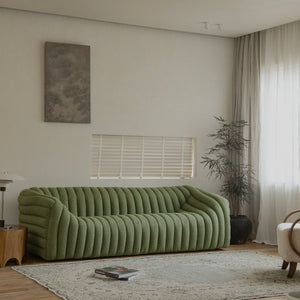 Miche Sofa in green, soft and comfortable, with a cozy living room setting