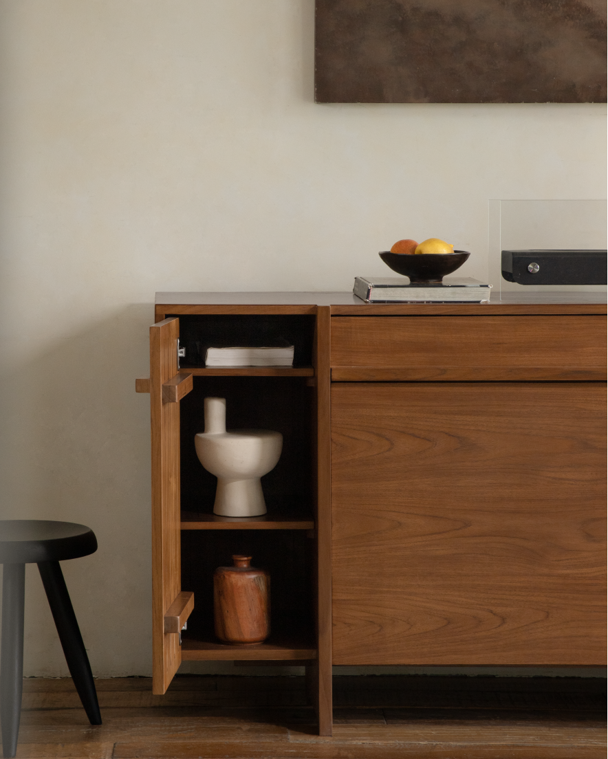 NO.42 teak wood sideboard with modern design, open storage shelves and styled countertop.