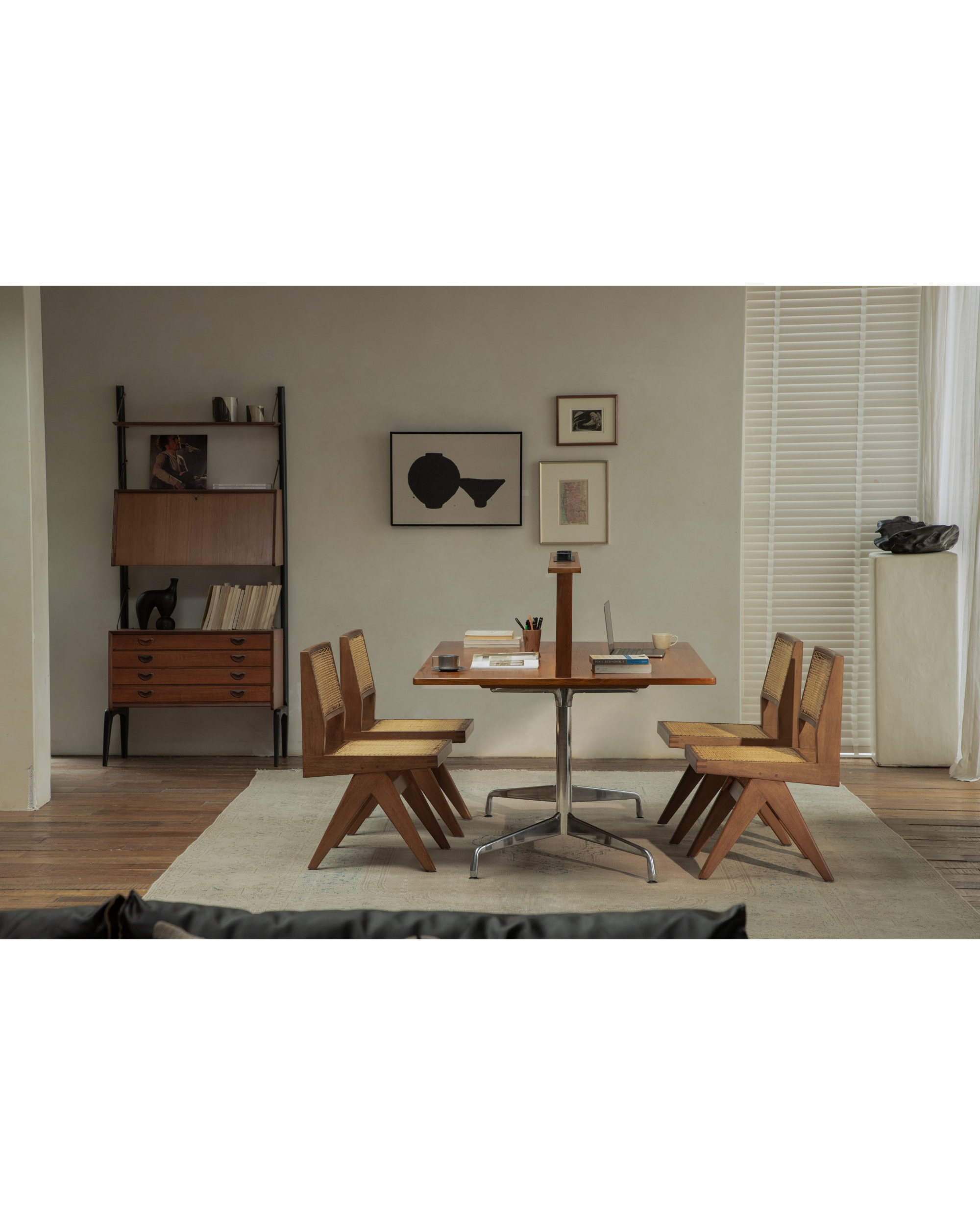 Evan Office Desk with teak top and metal legs, paired with vintage cane chairs.