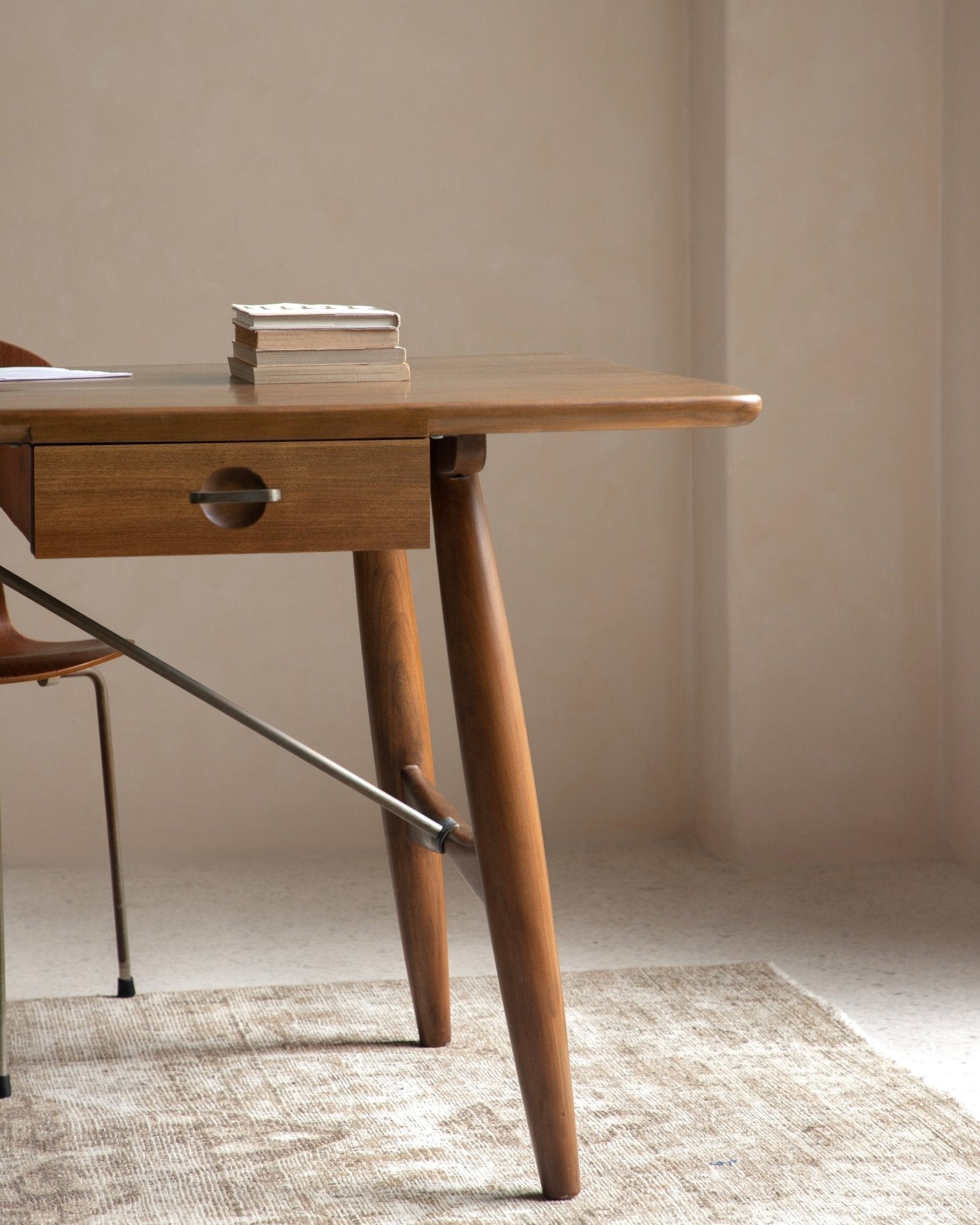 Architect Desk with teak wood, brass accents, and modern design in a home office setting