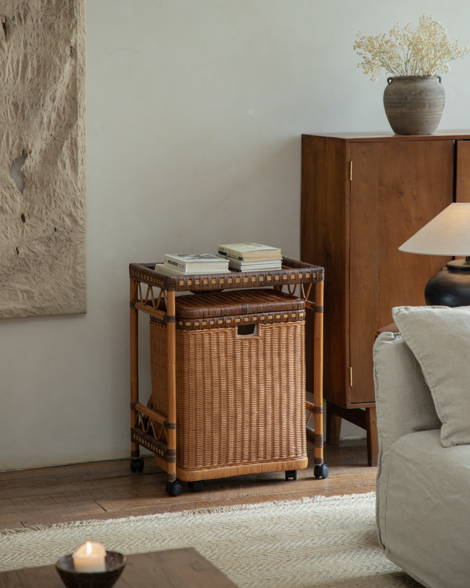 Milo Rattan Laundry Cart: handwoven storage with natural charm and wheels.