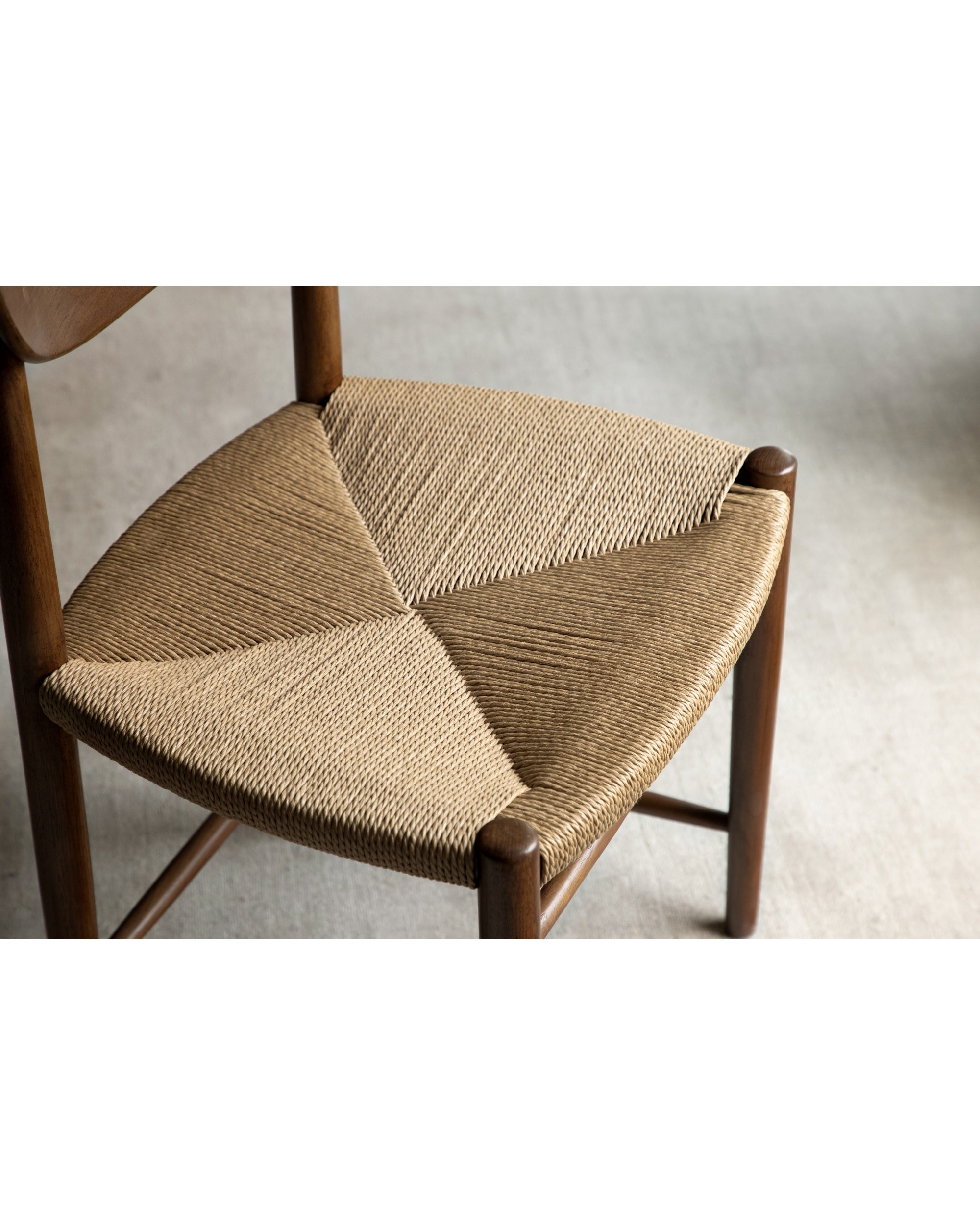 Margaret Dining Chair with woven rush seat and teak frame.