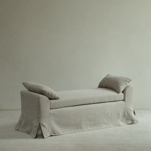 Linen gray Alina bench with plush cushioning and two pillows, a versatile seat for bedroom or living space.