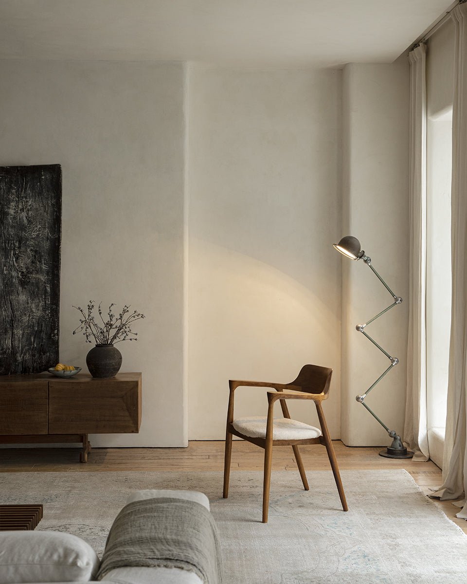 Hiroshima Chair in a modern living room setting, solid wood armchair with cushioned seat