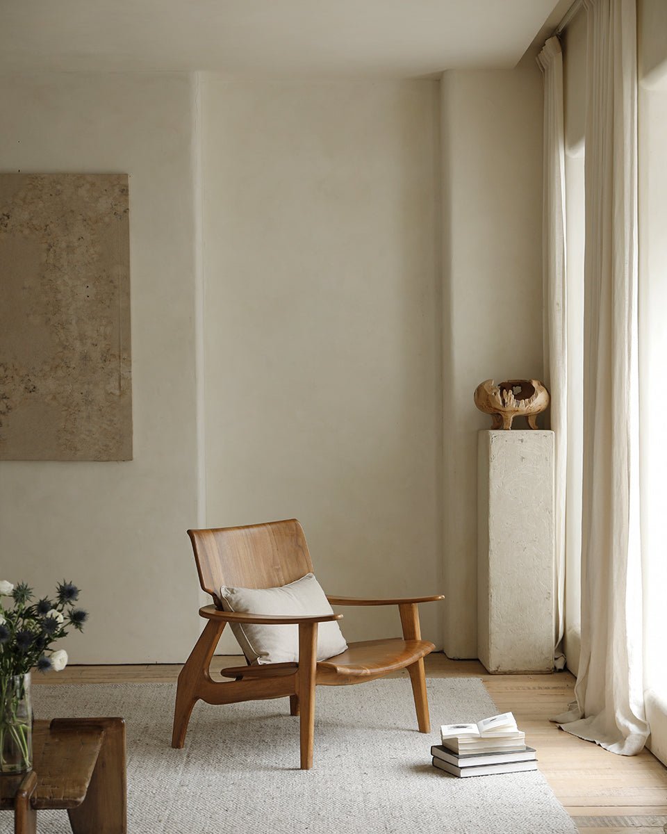 Zen Armchair in a Natural Light Setting, light brown wood, ergonomic design, spacious seating for relaxation and comfort